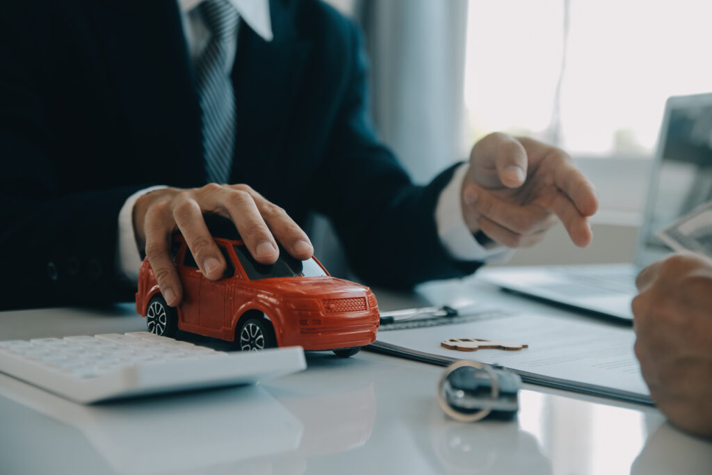 Closeup asian male people car salesman or sales manager offers t